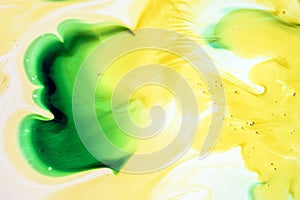 Watercolor and acrylic abstract. Colorful background. Mix, splashes and drawings of colors: green, yellow, brown, white background