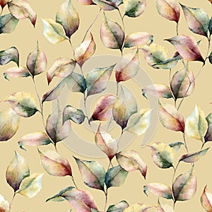 Watercolor autumn seamless pattern on yellow background. Hand painted leaves and branch isolated on pastel colors