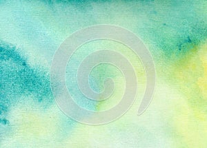 Watercolor background in green, yellow and blue colors. Raster abstract illustration. Hand drawn gradient painting.