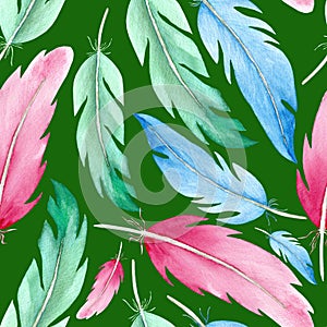 Watercolor bird feathers in pink and blue and green. Seamless pattern for textile design.
