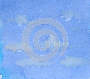 Watercolor blue sky background with clouds.