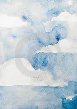 Watercolor blue sky with clouds, muted vertical background