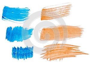 Watercolor brush stroke of blue and otange paint, on a white isolated background