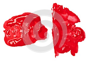 Watercolor brush stroke of red paint on a white isolated background