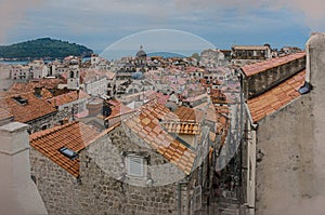 Watercolor effect of view of red rooftops and blue sea from Dubrovnik city wall, Dubrovnik, Croatia. View from above of old town