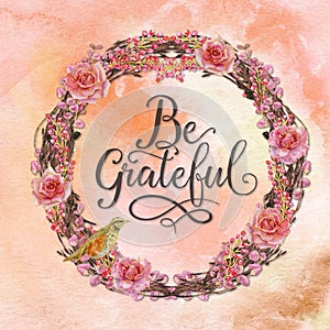 Watercolor floral wreath with script Be Grateful