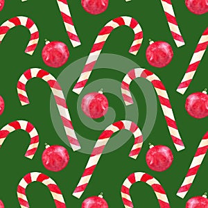 Watercolor hand drawn candy cane and red christmas ball seamless pattern on green background