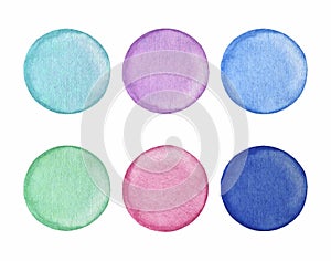 Watercolor hand drawn pastel colored circle stains on textured paper isolated on white background for design