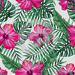 Watercolor hibiscus flower and palm leaves seamless pattern.