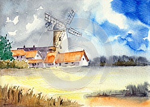 Watercolor illustration of a cozy village with a tall windmill behind a yellow field