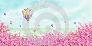 Watercolor landscape painting of hot air balloon and cherry blossom tree