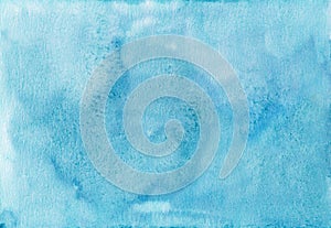 Watercolor light blue background painting texture. Vintage hand painted watercolour backdrop. Stains on paper