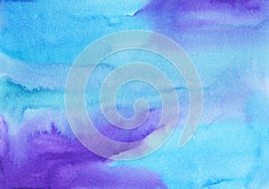 Watercolor light blue and purple background painting texture. Multicolored watery soft backdrop.