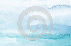 Watercolor light blue, sea green and white gradient background. Stains on paper