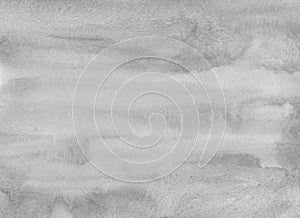 Watercolor light gray background texture. Grey abstract backdrop. Monochrome stains