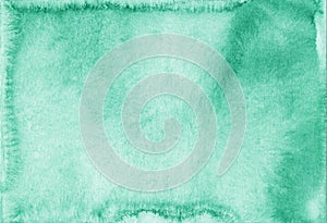Watercolor light sea green background texture. Aquarelle pastel emerlad backdrop. Stains on paper