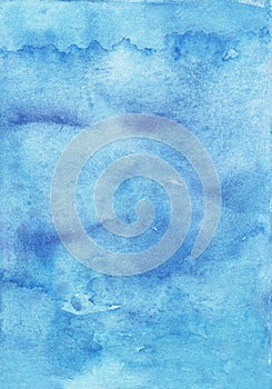 Watercolor old light blue background painting. Artistic watercolour backdrop texture. Sky blue stains on paper