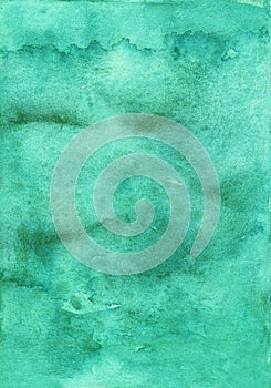 Watercolor old sea green background texture. Aquarelle abstract emerald backdrop. Stains on paper