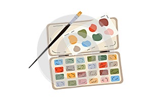 Watercolor paints box and drawing brush