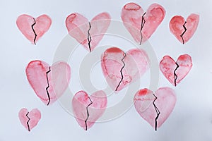 Watercolor red broken hearts on white background. Valentine day concept