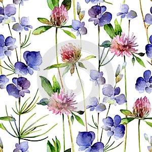 Watercolor seamless pattern with delphinium flowers and clover flowers photo