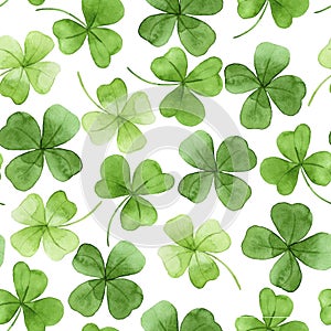 Watercolor seamless pattern on the theme of st. patrick`s day. green four-leaf clover leaves on a white background. holiday print