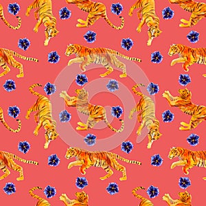 Watercolor seamless pattern with tigers and hibiscus flowers  isolated on pink background.
