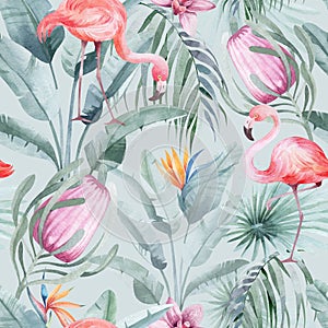 Watercolor seamless pattern with tropical flowers flamingo birds and plants.