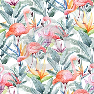 Watercolor seamless pattern with tropical flowers flamingo birds and plants.