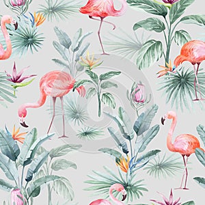 Watercolor seamless pattern with tropical flowers flamingo birds and plants.