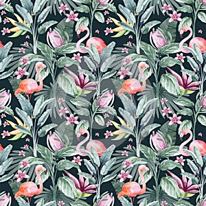 Watercolor seamless pattern with tropical flowers flamingo birds and plants.