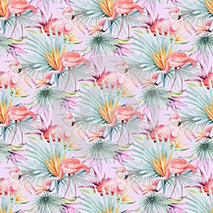 Watercolor seamless pattern with tropical flowers flamingo birds and plants.