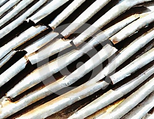Watercolor of stack of iron pipes on a construction site