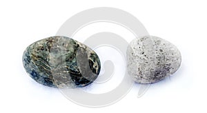 Watercolor stones. Dark basalt and light grey round shaped stones. Spa and cosmetic products isolated on white