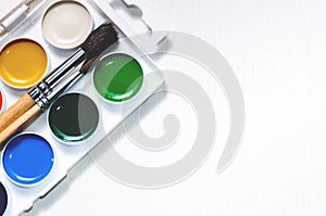 Watercolors and brushes