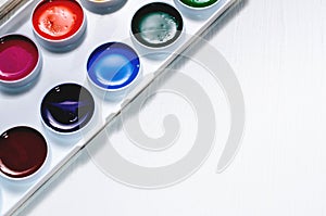 Watercolors and brushes