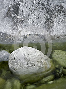 Watercourse brown stones reflexion