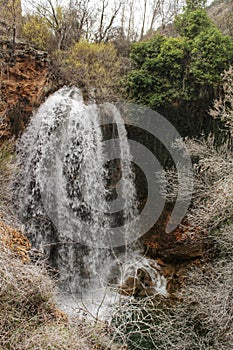 Waterfall and Alcaraz river crossing natural site of Los Batanes in spring