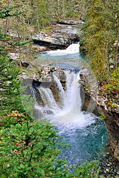 Waterfall along the Icefields Parkway in the Canadian Rockies between Banff and Jasper