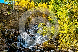 Waterfall with Aspens and Rocks