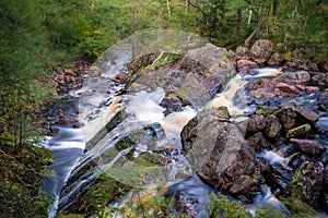 Waterfall during autumn in Danska Fall nature reserve close to Halmstad on the Swedish west coast.
