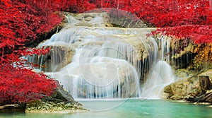 Waterfall in autumn forest at Erawan waterfall