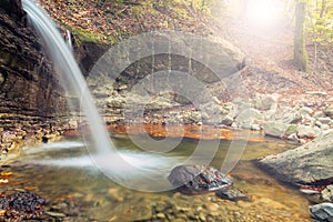 Waterfall. Autumn. Forest. Water. Stone. Sunny