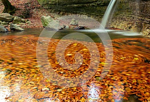 Waterfall. Autumn. Forest. Water. Stones. Leaves