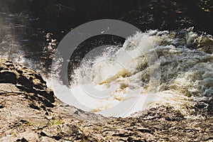 Waterfall background. rushing stream water. rocky flowing river