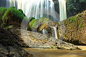 Waterfall and Basalt Stones in The Rain Forest