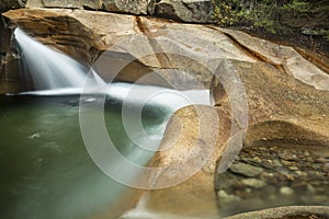 Waterfall at The Basin granite pothole, White Mountains, New Ham