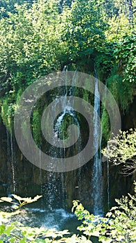 Waterfall and beautiful nature landscape, Plitvice Lakes in Croatia, National Park, sunny day with blue sky