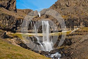 Waterfall Bergarfoss in Hornafjordur in south Icelandic countryside