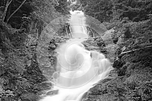 Waterfall blurred motion. Black and white photo